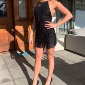 Black lace cocktail dress. Low back